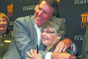 Courtesy photo Ruth Revels, a graduate of the University of North Carolina at Pembroke and longtime educator, is being remembered after her death on Monday. Revels taught Gov. Pat McCrory, seen here giving her a hug.