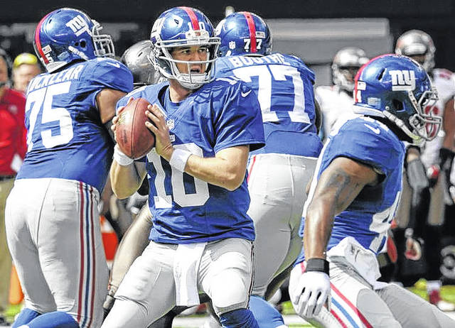 New York Giants tackle Sean Locklear (75) blocks Washington