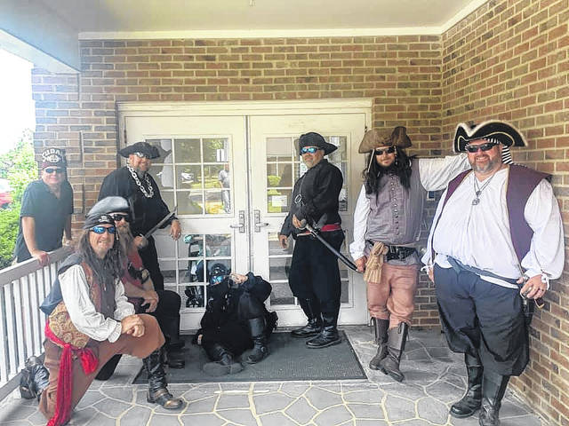 
			
				                                The Sudan Pirates pay a visit to residents at Glenflora Assisted Living Facility in Lumberton. The retirement facility was one of several the pirates visited to bring cheer to residents who are unable to see family because of the COVID-19 pandemic.
                                 Coutesy photo | Sudan Pirates

			
		