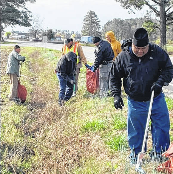 County residents, first responders join forces to remove roadside trash