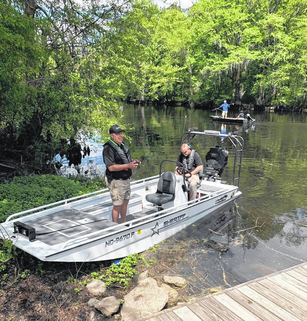 
			
				                                Robeson County Sheriff’s Office Lt. Kevin Graham, left, and Sgt. Timmy Ivey work Sunday on the Lumber River as part of a safety operation involving the Robeson County Sheriff’s Office River Patrol Unit and Traffic Enforcement Division, N.C. Wildlife Resources Commission and the N.C. Forensic Test for Alcohol BAT Mobile and Educational Specialist. Sunday was the first official operation in which the RCSO boat was used.
                                 Courtesy photo | Robeson County Sheriff Burnis Wilkins

			
		