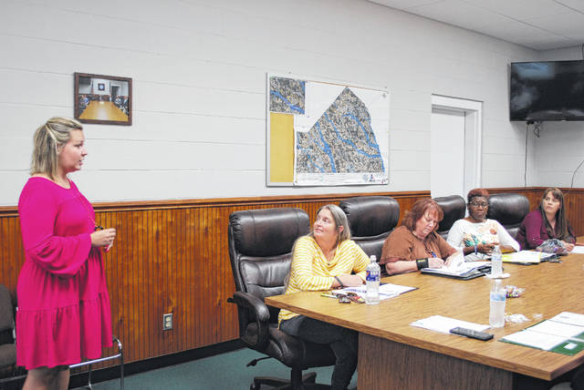 
			
				                                Leah Britt Lanier, left, speaks Thursday with St. Pauls commissioners during a regular Board of Commissioners meeting at Town Hall. Lanier introduced herself as a District Court judge candidate and said she would like to be involved in the community.
                                 Jessica Horne | The Robesonian

			
		