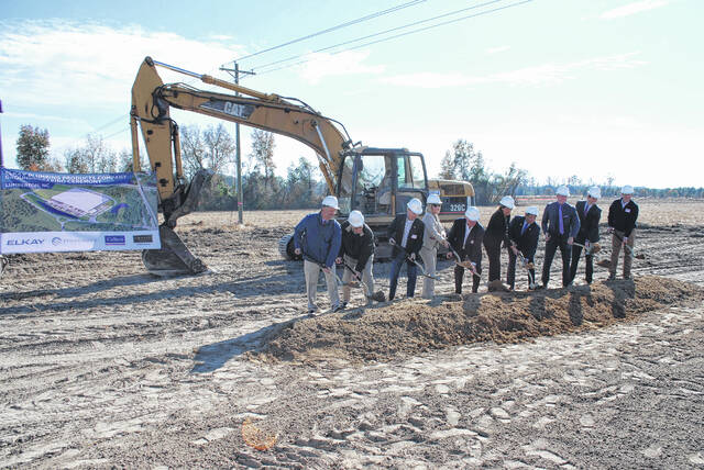 City, county officials turn dirt for Elkay distribution facility