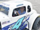 Rowland native Jake Locklear sits in the legends car he will race this year at an appearance last week at Bleecker Buick GMC in Red Springs.
                                 Chris Stiles | The Robesonian