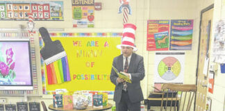 
			
				                                Robert Locklear, assistant superintendent of Curriculum, Instruction and Accountability at the Public Schools of Robeson County, could be seen reading Wednesday to Magnolia Elementary School students. Locklear also planned to read to more students at other schools during Read Across America Week.
                                Courtesy photo | Robert Locklear
                                 Courtesy photo | Robert Locklear

			
		