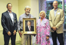 
			
				                                UNC Health Southeastern Vice President/Chief Medical Officer Dr. Joe Roberts, left, is shown with Dr. Walter Neal Jr.; his wife, Teresa; and UNC Health Southeastern President/CEO Chris Ellington after the unveiling of Dr. Neal’s portrait in recognition of his 39 years of service as an OB/GYN affiliated with UNC Health Southeastern.
                                 Courtesy photo | UNC Health Southeastern

			
		