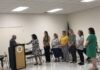 
			
				                                Fairmont Mayor Charles Kemp, left, recognizes Tuesday members of the Hearts N Hands Civitan Club for the club’s event on June 11 that gave people with special needs a night to remember with dancing, music and plenty of pizza.
                                 Jessica Horne | The Robesonian

			
		