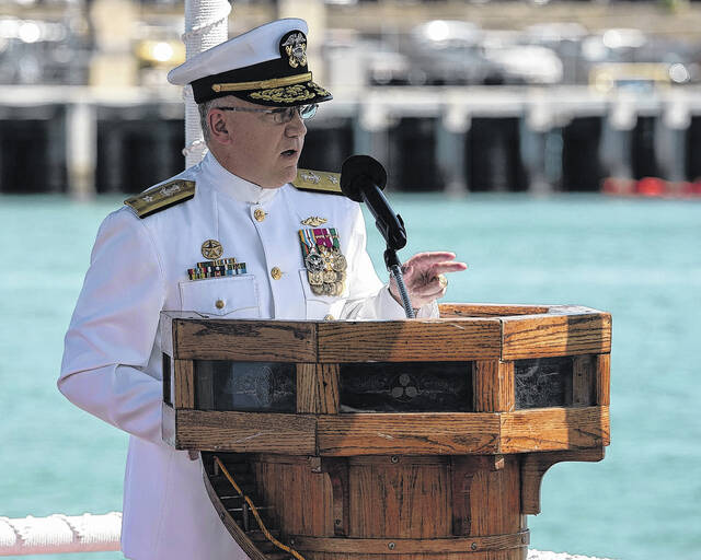 Capt. Robert A. Roncska, commander of Submarine Squadron 7, addresses  guests during a change of command and retirement ceremony on the submarine  piers at Joint Base Pearl Harbor-Hickam, Hawaii. - PICRYL 