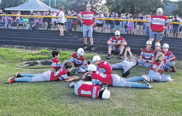 <p>Members of the Alabama AAA team wait before the Dixie Youth World Series opening ceremony Friday at Alton G. Brooks Stadium in Lumberton.</p>
                                 <p>Chris Stiles | The Robesonian</p>
