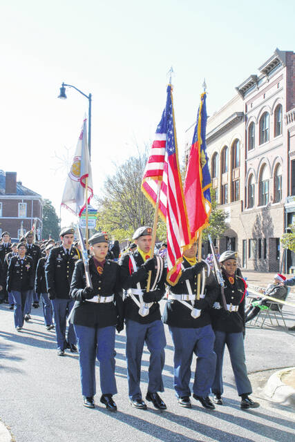<p>The Lumberton Senior High School JROTC was one of the first units in the Lumberton Christmas Parade held Saturday along Elm Street.</p>
                                 <p>Tomeka Sinclair | The Robesonian</p>