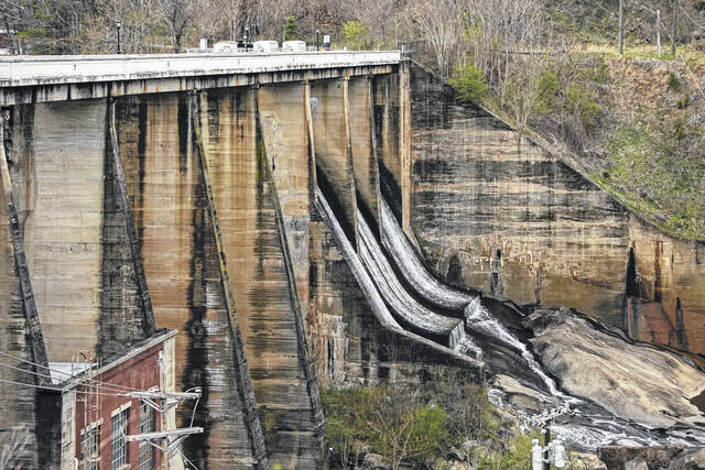 
			
				                                The Lake Lure dam on March 24. Lake Lure received $200,000 in American Rescue Plan Act funding from the state to conduct an assessment of their sewer system, located beneath the Western North Carolina lake.
                                 Colby Rabon|Carolina Public Press

			
		
