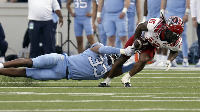 UNC football drops season finale in 30-27 double-overtime loss to N.C.  State - The Daily Tar Heel