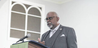 
			
				                                The Rev. Ricky Banks, president of the General Baptist State Convention of N.C., speaks during the Martin Luther King Jr. Celebration held Monday by the Robeson County Black Caucus at Bethany Presbyterian Church.
 
			
		