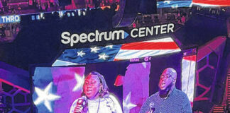 
			
				                                Former Lumberton residents David and Tiffany Spencer sing the national anthem during the Hornets game against the Boston Celtics on Monday on Martin Luther King Jr. Day at the Spectrum Arena.
 
			
		