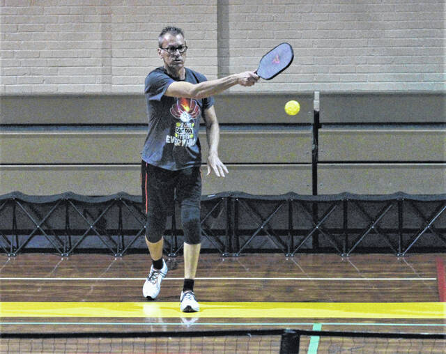 
			
				                                Stevie Flowers hits a return shot during a recent pickleball game at Bill Sapp Recreation Center in Lumberton. Flowers leads a group that plays each Friday afternoon and is making efforts to grow the game locally.
                                 Chris Stiles | The Robesonian

			
		