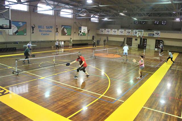 <p>Friday afternoons are for pickleball at the Bill Sapp Recreation Center in Lumberton. Pictured, 12 players play doubles matches across three courts inside the gym.</p>
                                 <p>Chris Stiles | The Robesonian</p>