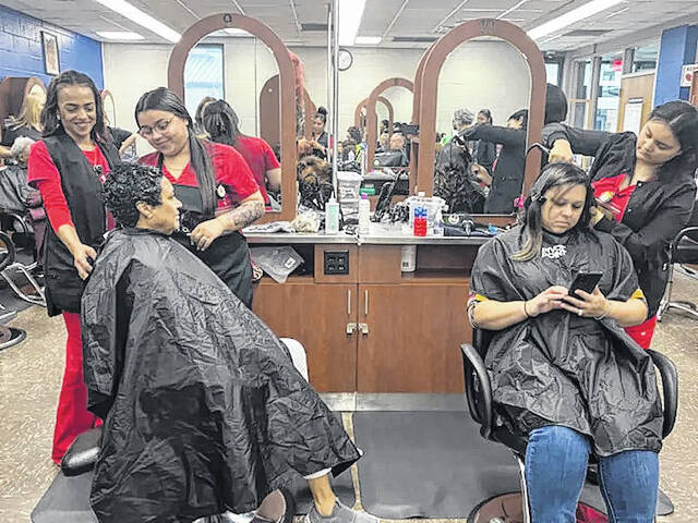 <p>Cosmetology students hone their craft at Robeson Community College.</p>
                                 <p>Sarah Nagem | Border Belt Independent</p>