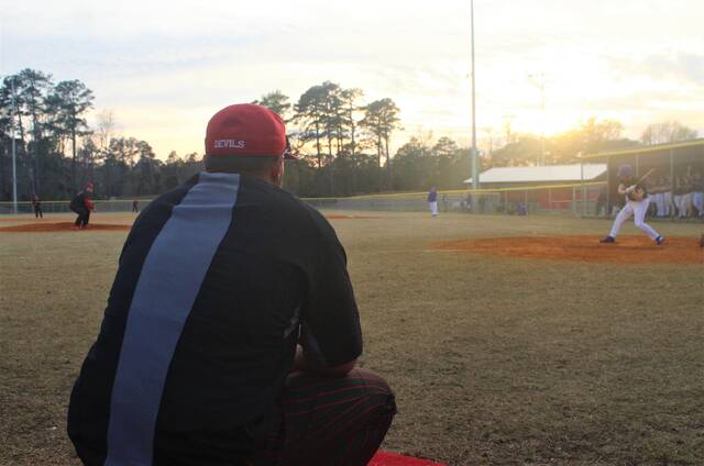 <p>Red Springs baseball coach Matt Strickland watches as Tim Hammonds pitches to a Midway batter during Thursday’s game at the Red Springs High School Athletic Complex.</p>
                                 <p>Chris Stiles | The Robesonian</p>