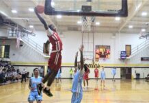 
			
				                                Red’s J.B. Brockington, from Lumberton, goes up for a dunk on an alley-oop pass from Tre Lewis, not pictured, from Lumberton, during the Robeson County Basketball All-Star Game on Saturday at Lumberton.
                                 Chris Stiles | The Robesonian

			
		