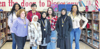 
			
				                                The LJHS Quiz Bowl Team from left to right; Bella Miray, Lamia Alsaidi, Salsabil Shammakh, Gaida Alsayadi, and on the back row, Candise Bickerstaff, Ibrahim Abumohsen, Hayden Forbes, and Coach Ms. April Wright.
                                 Courtesy photo | Public Schools of Robeson County

			
		