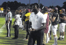 
			
				                                Lumberton coach Dennis McFatten gives his team instructions during a Sept. 8, 2023 game against Red Springs in Lumberton. McFatten announced in a Thursday social media post he will step down as Lumberton head coach after one season.
                                 Chris Stiles | The Robesonian

			
		