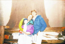 
			
				                                David, Suesan and baby Noah Kennard visit the General Sherman Tree — the largest tree on Earth — on a foggy day in 1996.
 
			
		