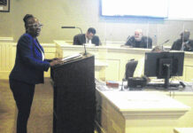 
			
				                                Alice McLean, left, speaks to Lumberton City Council regarding her rezoning request to build an event center on Martin Luther King Jr. Drive in South Lumberton. McLean’s request was denied by a unanimous vote.
                                 Chris Stiles | The Robesonian

			
		