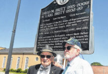 
			
				                                W. Earl Britt, left, retired senior United States district judge of the U.S. District Court for the Eastern District of North Carolina, on Thursday stands with longtime Fairmont resident Jim Pate, who spearheaded the effort to erect a historical marker honoring Britt and older brother the late David M. Britt, former Speaker of the North Carolina House of Representatives, an original judge of the North Carolina Court of Appeals, and a justice of the North Carolina Supreme Court.
 
			
		