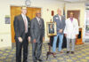 
			
				                                UNC Health Southeastern Vice President and Chief Medical Officer Dr. Joe Roberts unveiled a portrait of Dr. Staley Jackson in honor of his retirement during a celebration on Feb. 17. Pictured with Dr. Roberts, from left, are Dr. Jackson, UNC Health Southeastern President/CEO Chris Ellington, and UNC Health Primary Care Medical Director Dr. Dennis Stuart.
 
			
		