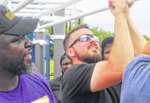 
			
				                                Michael Lynch, right, a contractor for Kaboom! play equipment, works with PSRC School Board member Vonta Leach to install equipment Saturday on a new play space near Lumberton Junior High School.
 
			
		