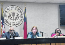 
			
				                                From left, Red Springs Mayor Edward Henderson, Town Manager Jane O’Neal, Commissioner Caroline Sumpter during Tuesday’s heated Town Council meeting.
                                 Michael Futch | The Robesonian

			
		