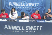
			
				                                Purnell Swett’s Wren Jacobs, second from left, and Jace Jacobs, center, each sign to play college soccer at Louisburg during a ceremony Wednesday in Pembroke.
                                 Chris Stiles | The Robesonian

			
		