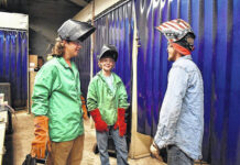 
			
				                                Summer campers Ken Rogers and Chandler Wall talk with instructor Kodi West as they get ready to weld at Robeson Community College.
                                 Courtesy RCC

			
		
