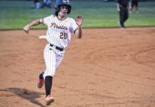 
			
				                                Lumberton’s Alona Hanna runs the bases during the April 2 Robeson County Slugfest championship against East Columbus in Lumberton.
                                 Zack Ciboth | Special to The Robesonian

			
		