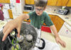 
			
				                                Thomas Underwood, 10, removes a jar of his grape jelly from boiling water recently at the NC Cooperative Extension Robeson County Center. Thomas and other 4-H members plan to have their jelly judged at the Robeson Regional Agricultural Fair, which runs from Sept. 27 to Oct. 5.
                                 David Kennard | The Robesonian

			
		